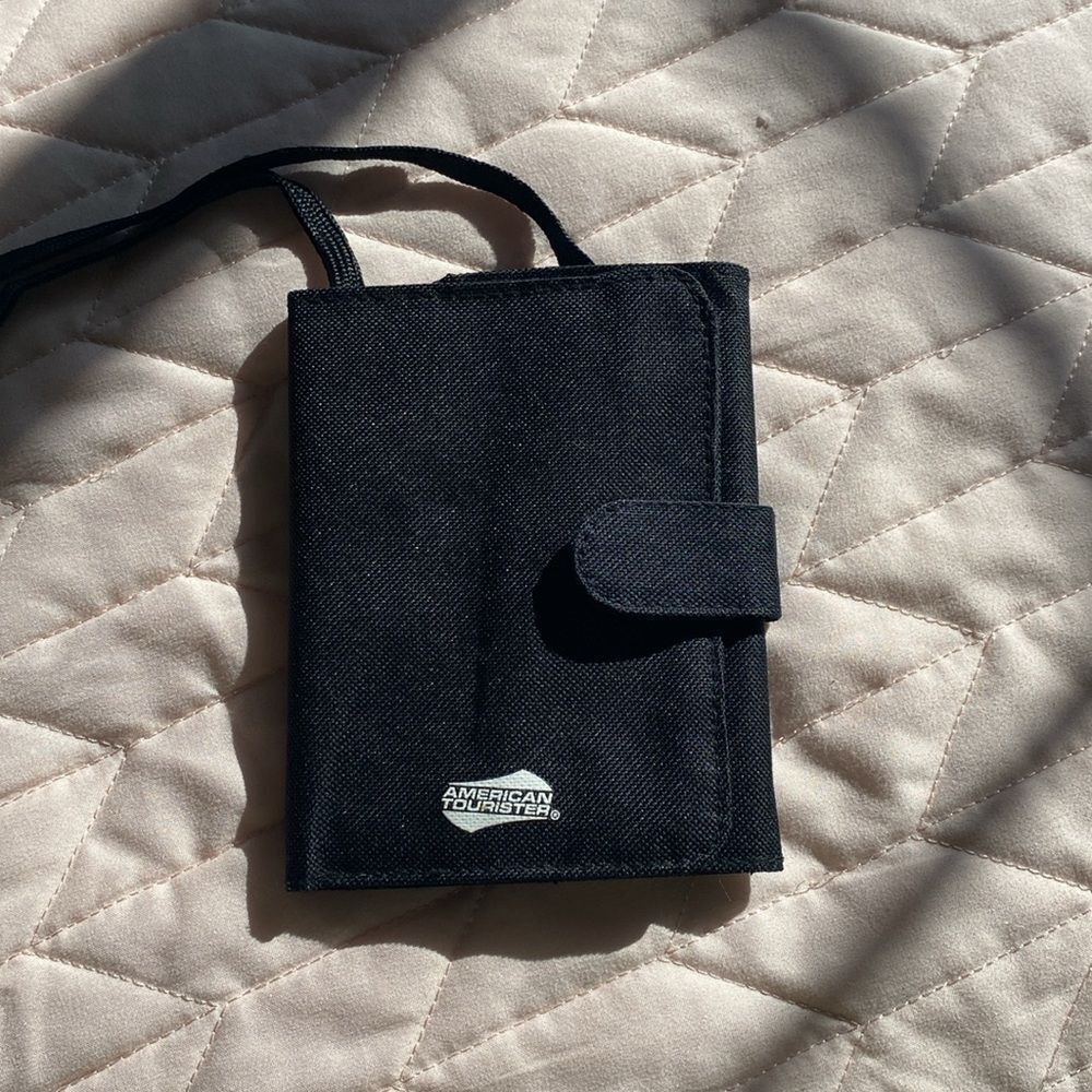 Black American Tourister  travel wallet